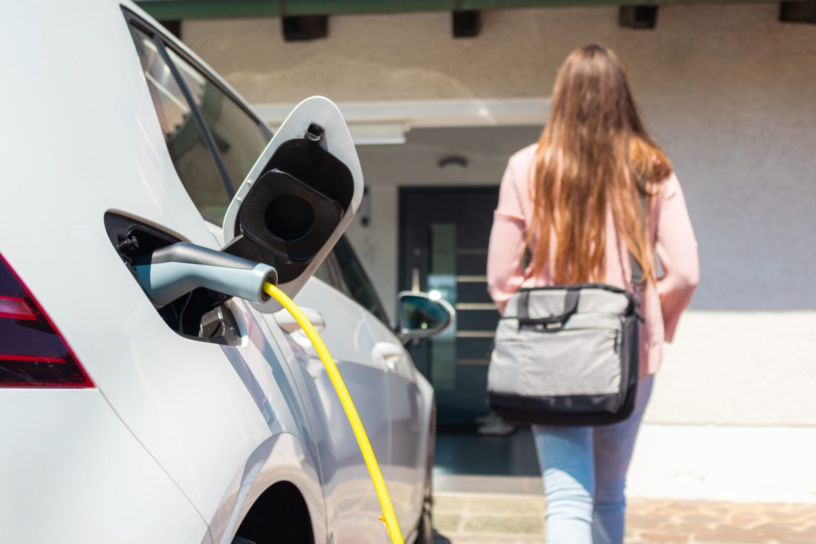 Electric car charger plugged in