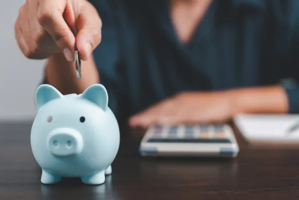 Saving investment banking finance concept. Stack of coins with piggy bank on the table. Growth of loan and investment business idea. Asset Management, Funds, Liabilities, Deposits, Income, Successful.